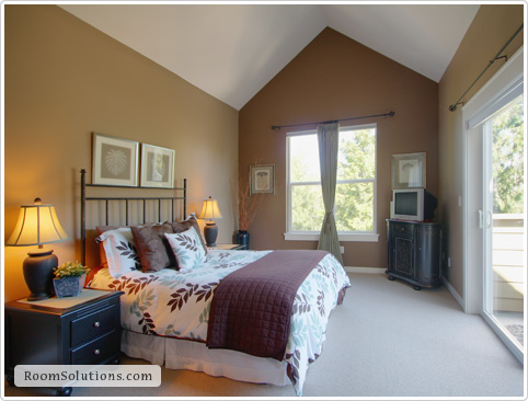 Home staging of (occupied) bedroom by Room Solutions Staging in Portland, OR