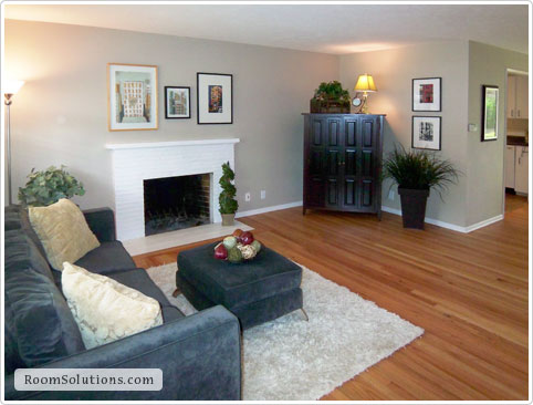 Home staging of (occupied) living room by Room Solutions Staging in Portland, OR